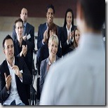 Team of business colleagues at seminar